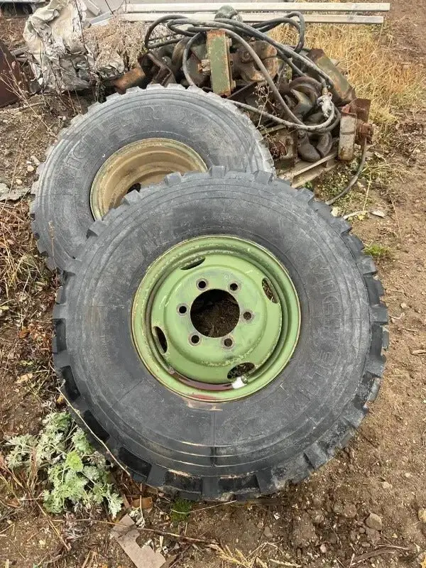 9.00R16 Michelin Military Surplus Tire & Rim – All-Terrain Assembly With Mixed Tread Patterns 1